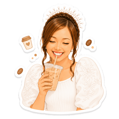 Meri sipping an iced coffee — slowly